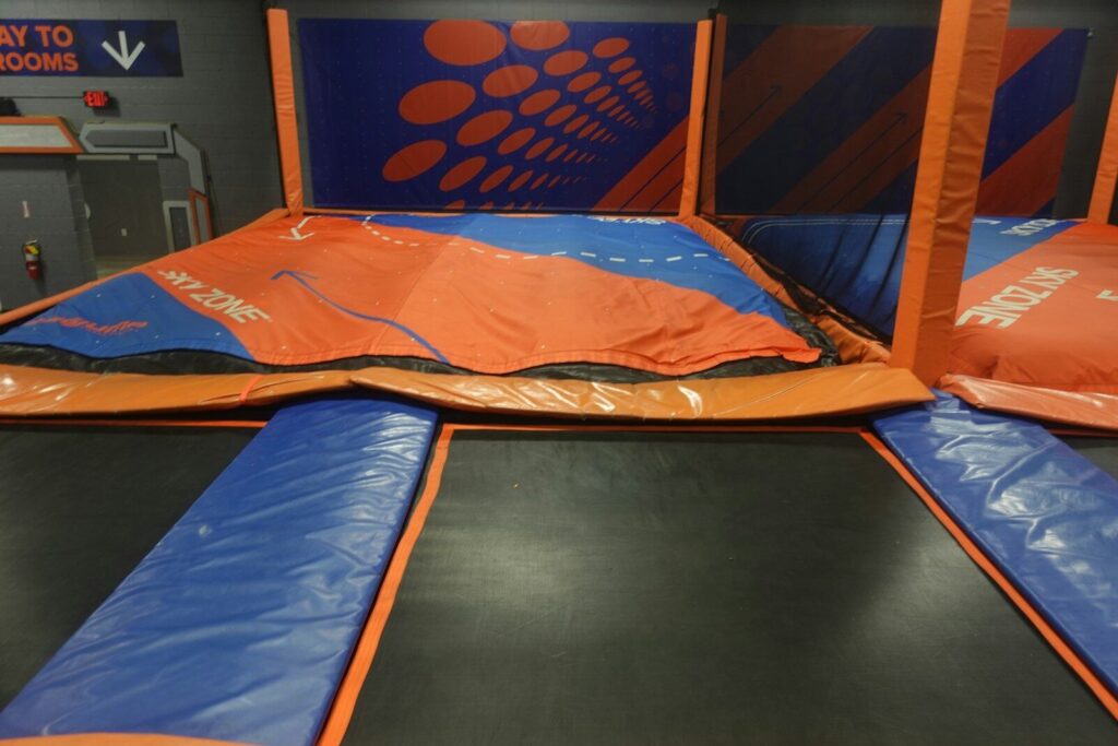 Spirit Nights: Easy, No-Stress PTA Fundraising ideas that will not burn out volunteers. 2 Trampolines at an indoor trampoline park.